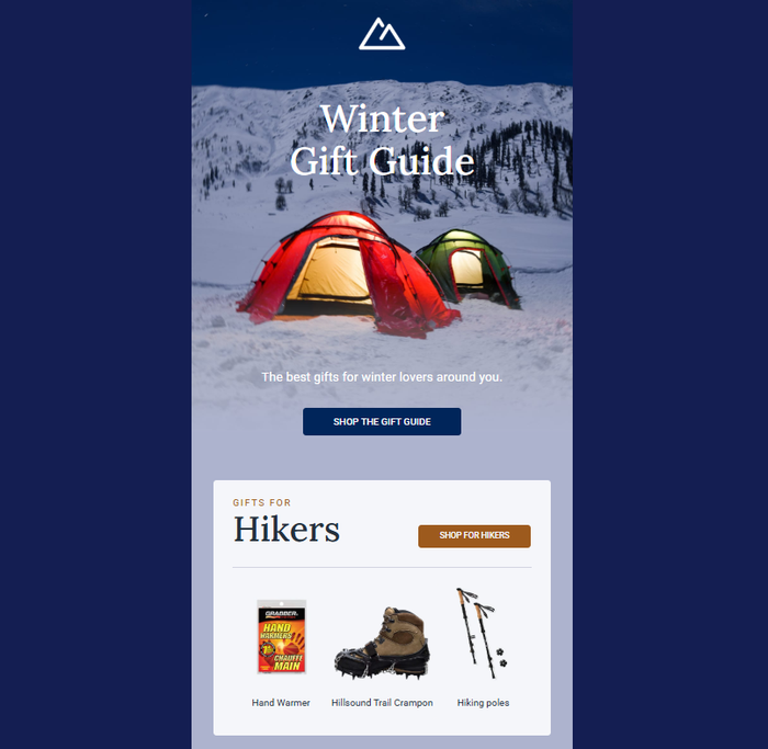 Winter Gift Guide email template for outdoor gear. Dark blue design with two glowing tents in a snowy landscape. Promotes gifts for hikers like hand warmers and crampons.